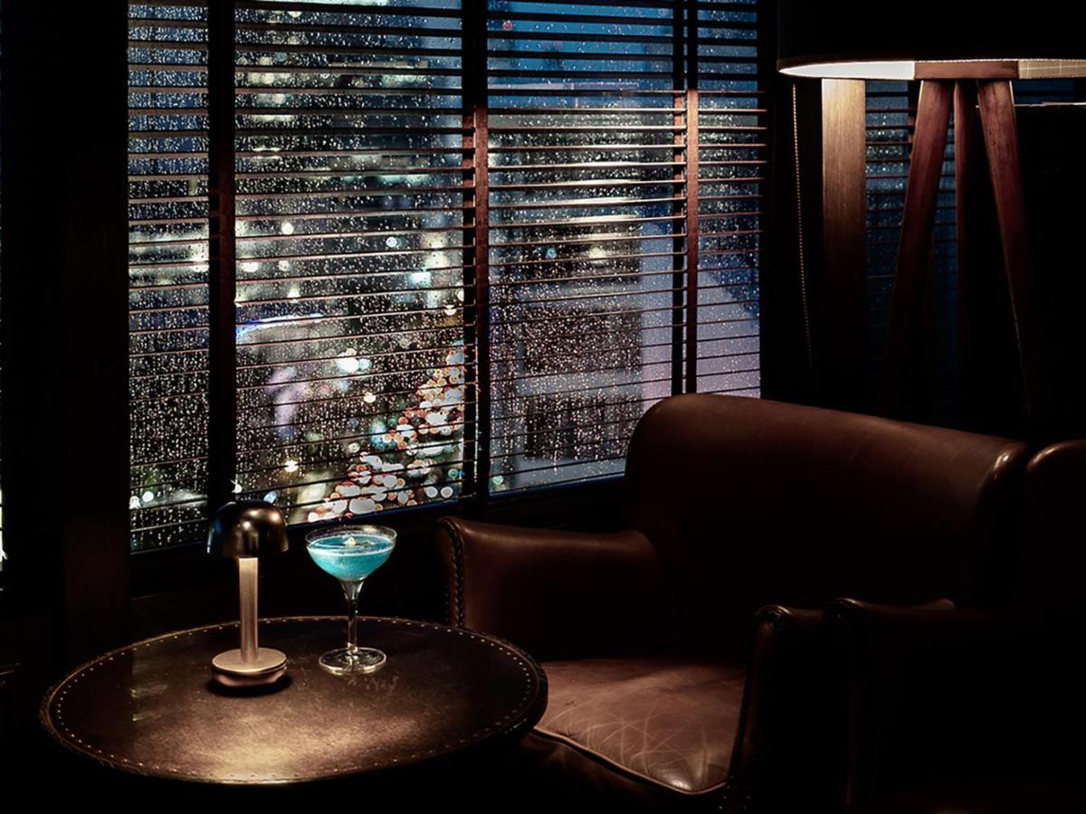 Muu Bangkok, Small Luxury Hotels Of The World Exterior foto The bar at the Mandarin Oriental, Hong Kong